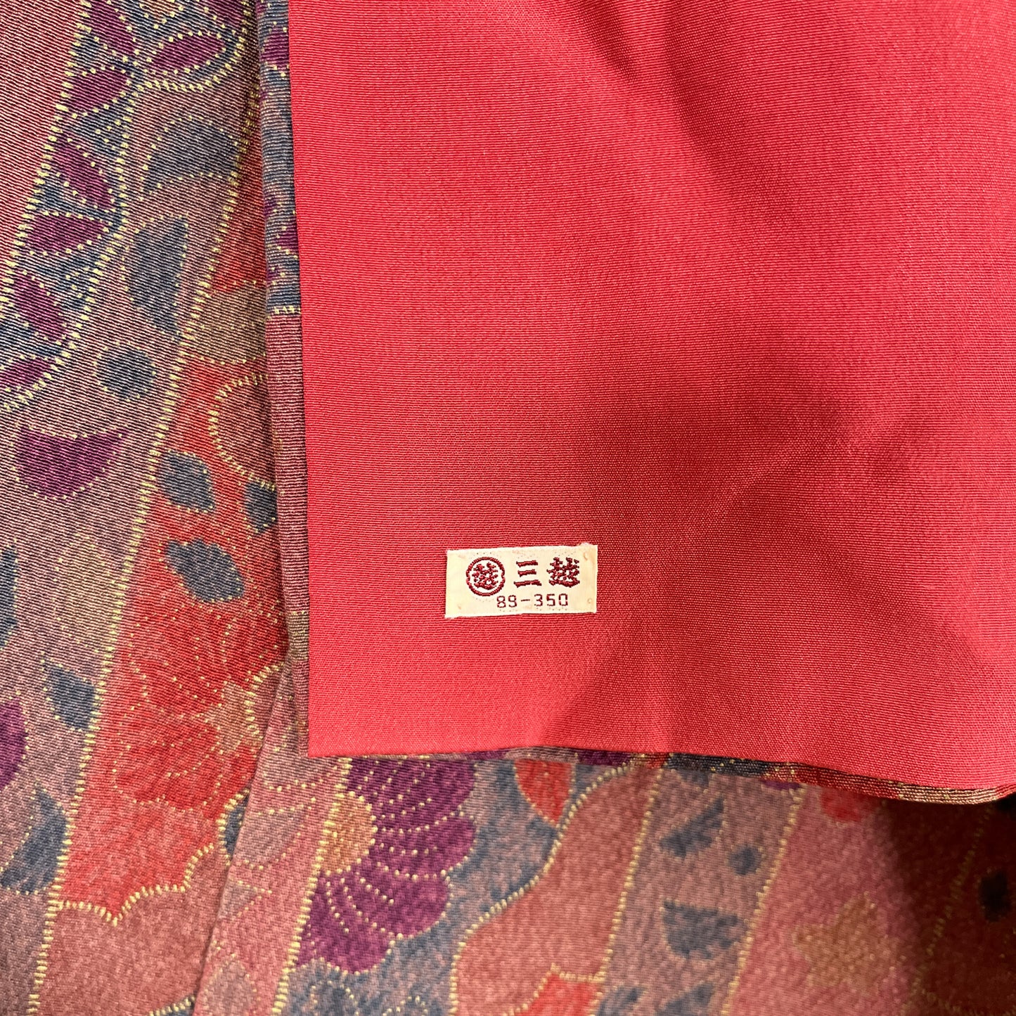K36119-1　小紋　付下げ　サーモンピンク地　短冊花柄　刺繍